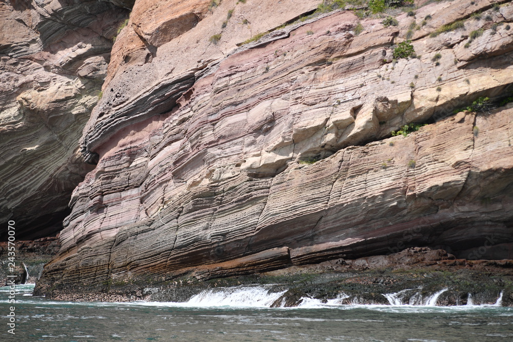 A cliff with cracks at the coast of Mazathlan-Mexico. A cliff with cracks at the coast of Mazathlan-Mexico.