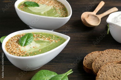 Vegetarian spinach soup in a white plate.