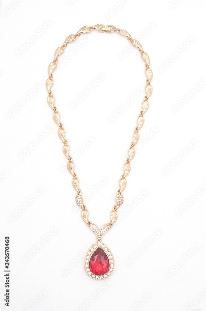 golden pendant with ruby and diamonds isolated on white golden pendant with ruby and diamonds isolated on white