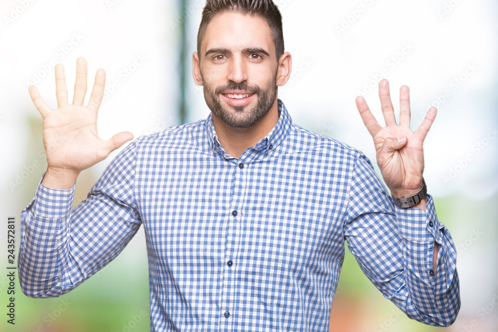 Young handsome man over isolated background showing and pointing up with fingers number nine while smiling confident and happy. Young handsome man over isolated background showing and pointing up with fingers number nine while smiling confident and happy.