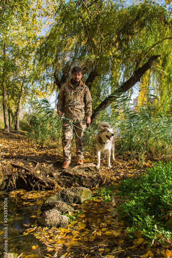 a hunter with a dog