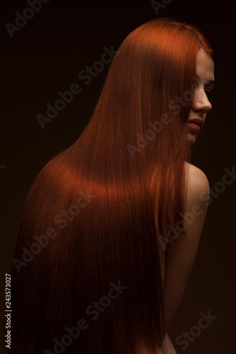 Portrait of Beautiful Woman with Long Hair