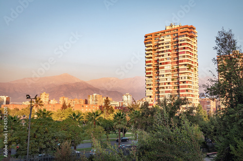 Las Condes neighborhood and Andes Mountains on background - Santiago, Chile photo