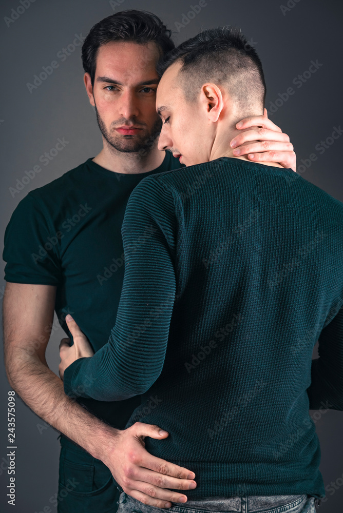 Sexy young gay couple in love, embracing and hugging each other Stock Photo  | Adobe Stock