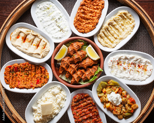 Arabic food, Meze - Delicious humus plate, beautifully arranged vegetarian oriental spreads photo