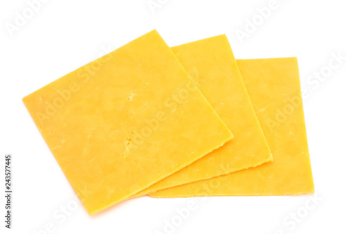 Slices of Cheddar Cheese on a White Background