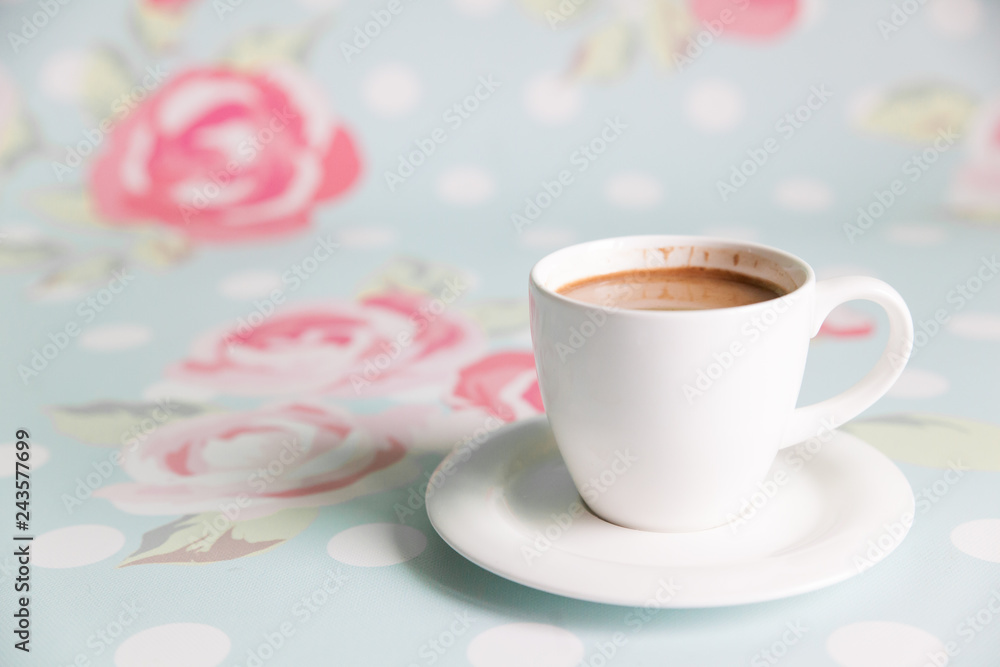 Morning coffee on floral background Morning coffee on floral background
