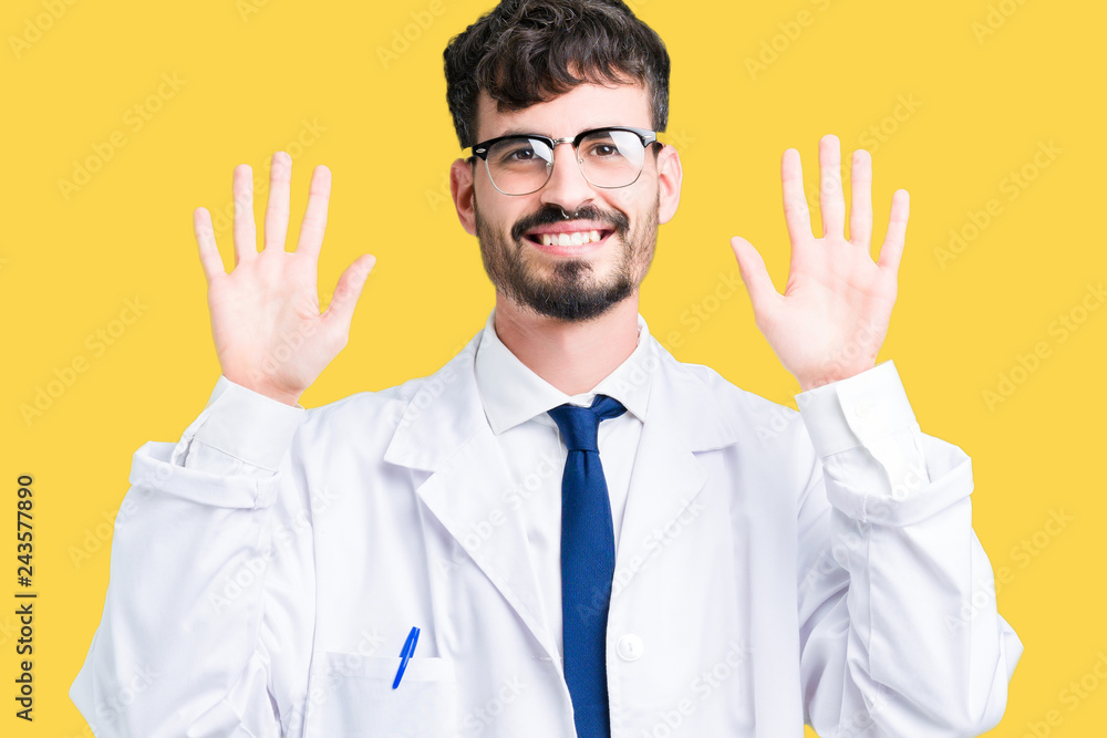 Young professional scientist man wearing white coat over isolated background showing and pointing up with fingers number ten while smiling confident and happy. Young professional scientist man wearing white coat over isolated background showing and pointing up with fingers number ten while smiling confident and happy.