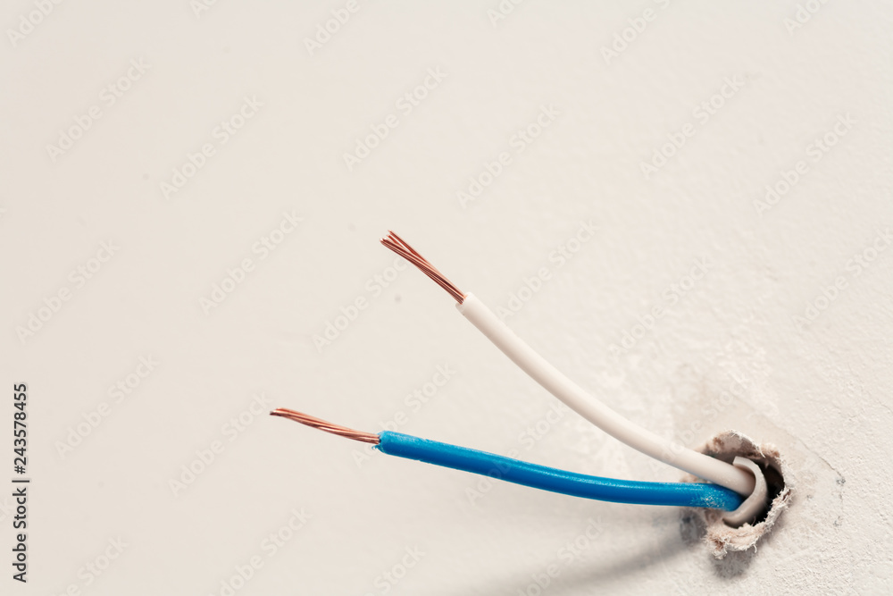 Unconnected electric wires from wall. Unconnected electric wires from wall.