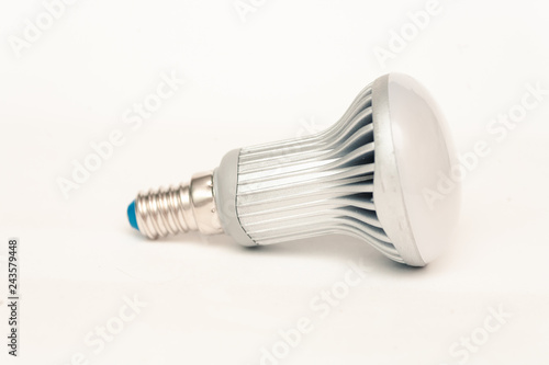 Energy saving LED light with bulb E27. Image on white background side view
