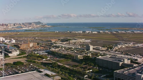 Honolulu, Oahu, Hawaii circa-2018.  Aerial view of Honolulu International Airport.  Shot with Cineflex and RED Epic-W Helium.  photo