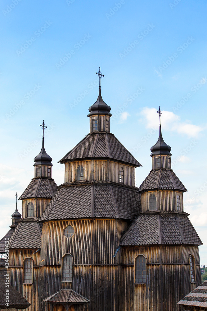 Old wooden Orthodox Christian church of Zaporizhzhya Cossacks on the island of Khortytsya in the Ukrainian city of Zaporozhye .  Ukraine