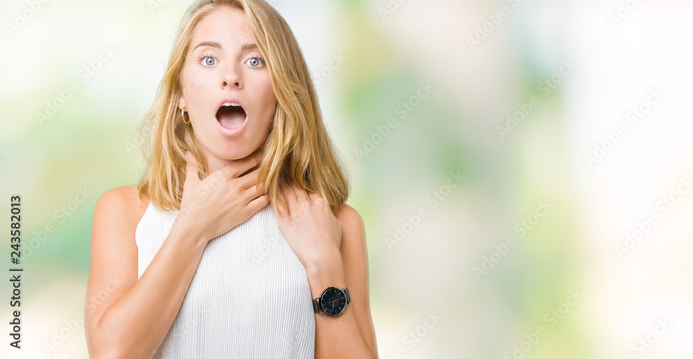 Beautiful young elegant woman over isolated background shouting and suffocate because painful strangle. Health problem. Asphyxiate and suicide concept. Beautiful young elegant woman over isolated background shouting and suffocate because painful strangle. Health problem. Asphyxiate and suicide concept.