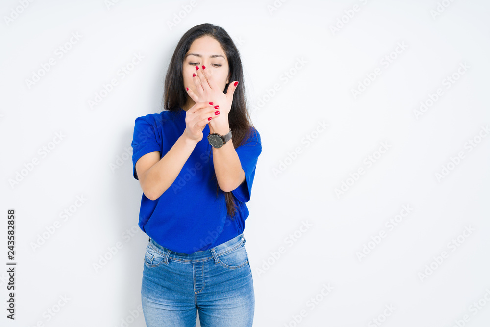 Beautiful brunette woman over isolated background Suffering pain on hands and fingers, arthritis inflammation Beautiful brunette woman over isolated background Suffering pain on hands and fingers, arthritis inflammation