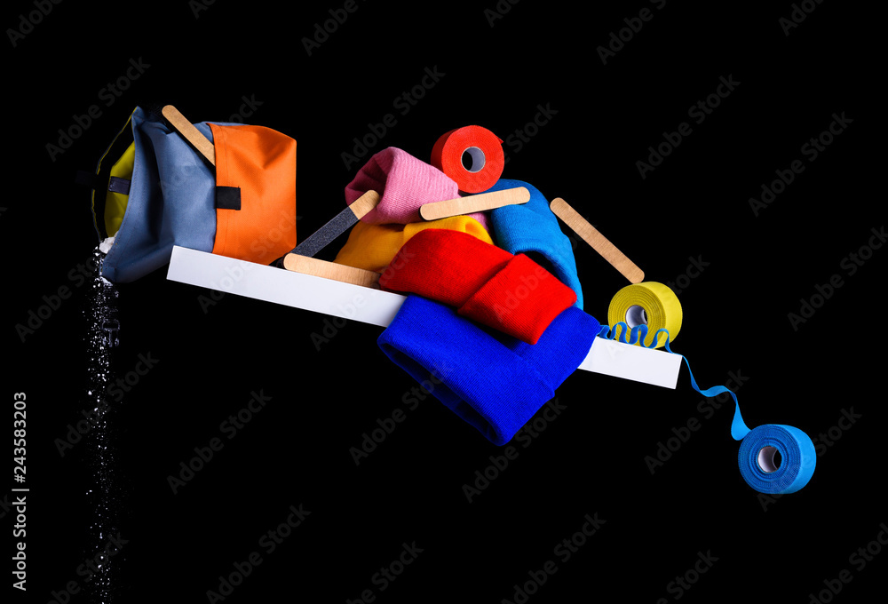 Fototapeta premium Sport equipment and apparel, kinesiology tape, white chalk powder