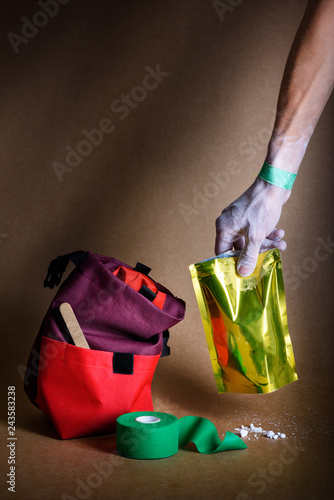 Climbing sport equipment. Chalk, magnesium, bag and plaster roll. photo