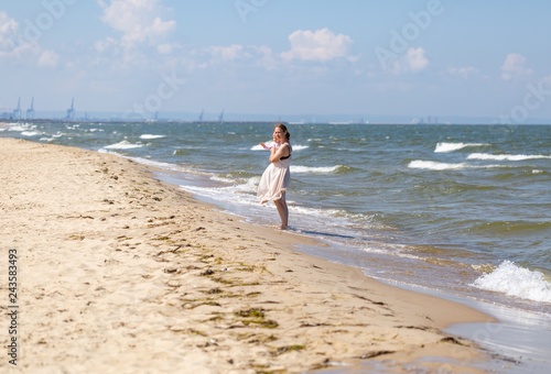 Happy woman spending time on beach