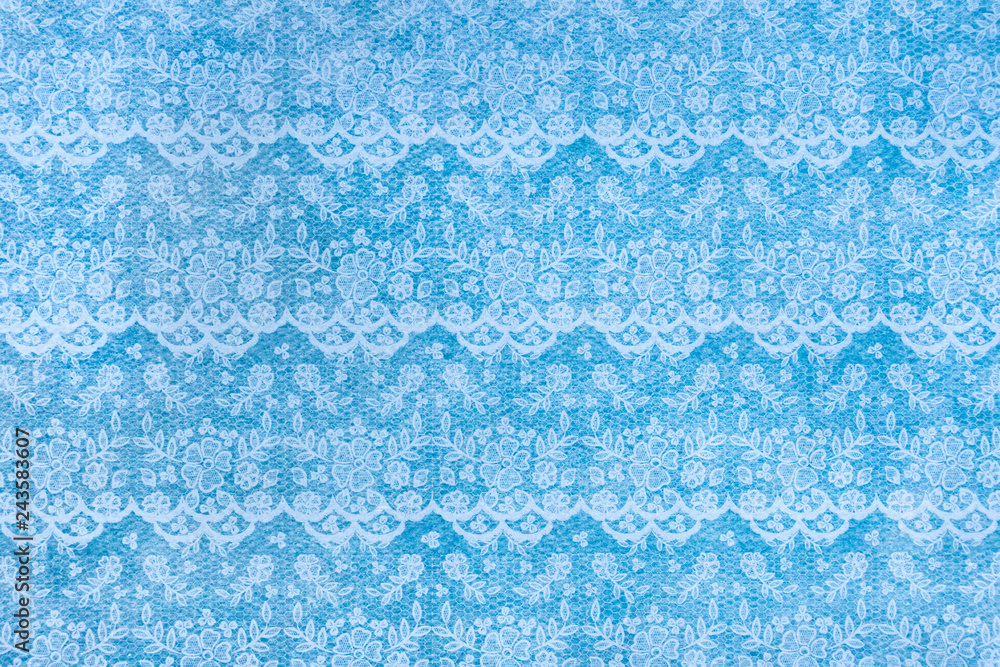 White Lace Pattern on the Blue Background