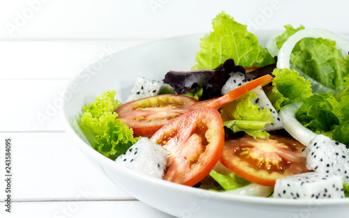 Healthy salad bowl on white wooden background, Have lunch time Healthy salad diet food, vegetarian diet, food and health concept.