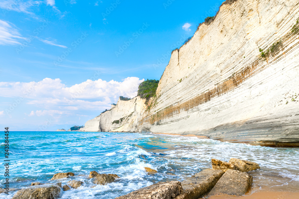 Logas Beach and amazing rocky cliff in Peroulades. Corfu Island. Greece