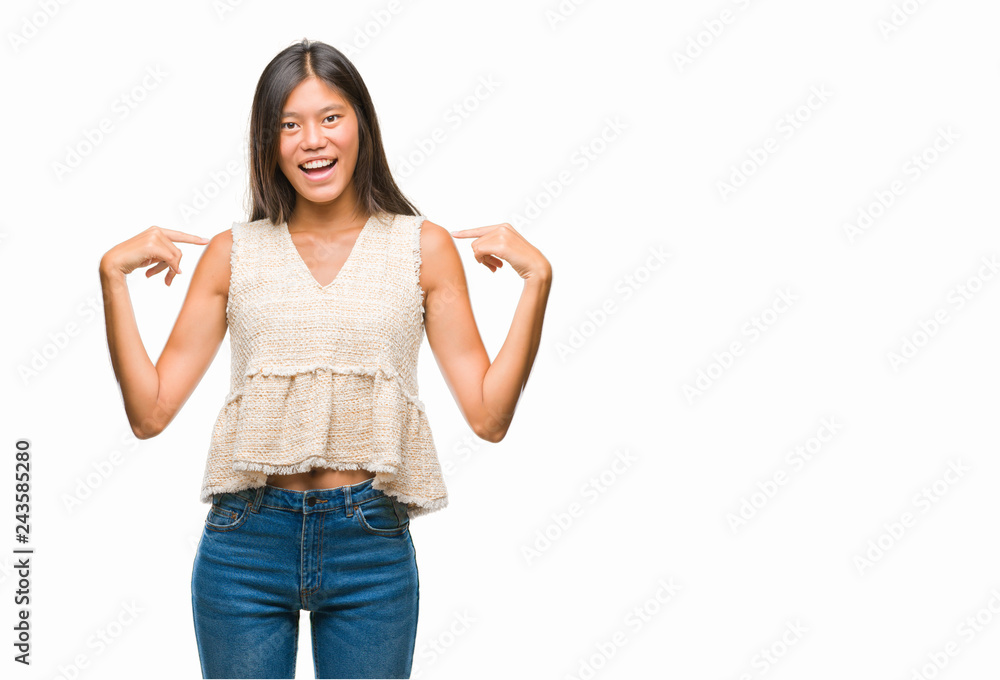Young asian woman over isolated background looking confident with smile on face, pointing oneself with fingers proud and happy. Young asian woman over isolated background looking confident with smile on face, pointing oneself with fingers proud and happy.