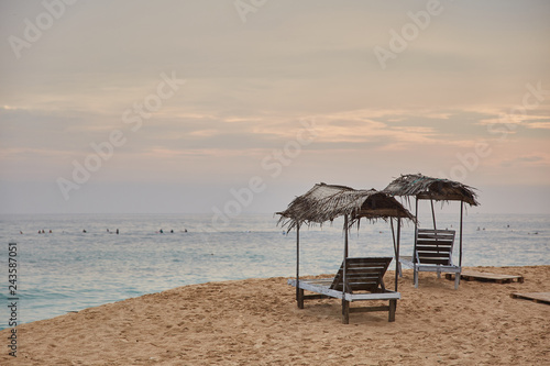 two sun loungers. Midigama Beach. Sunset in the Indian ocean. Midigama, Sri Lanka © Dima Anikin