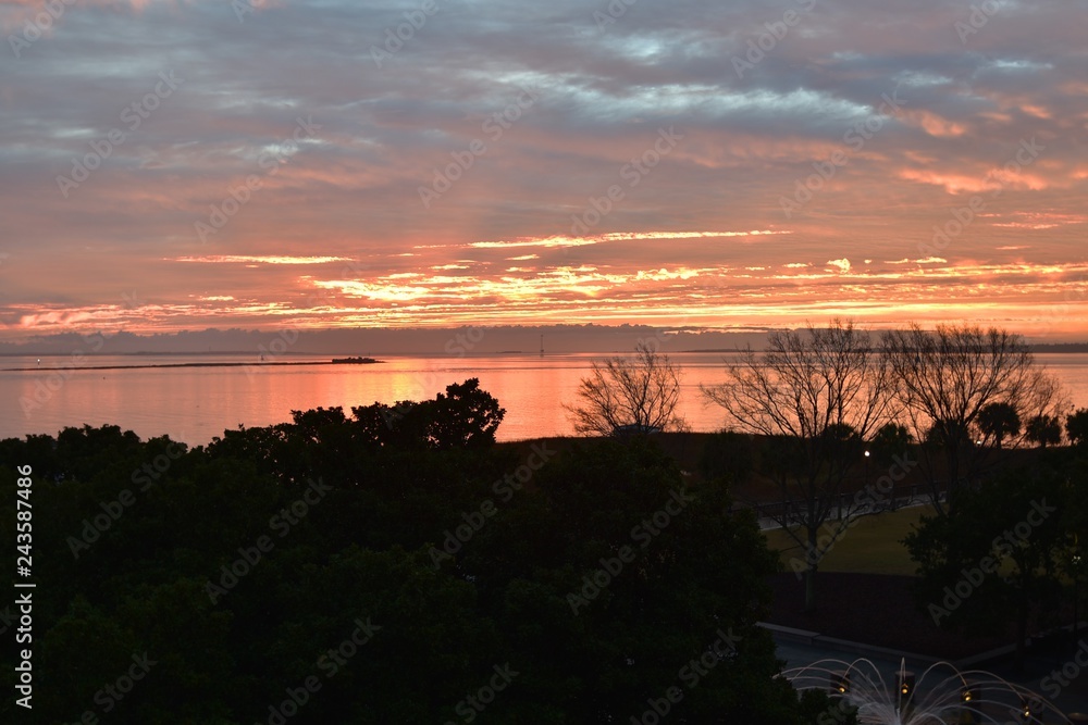 Fototapeta premium Sunrise over Charleston harbor in South Carolina