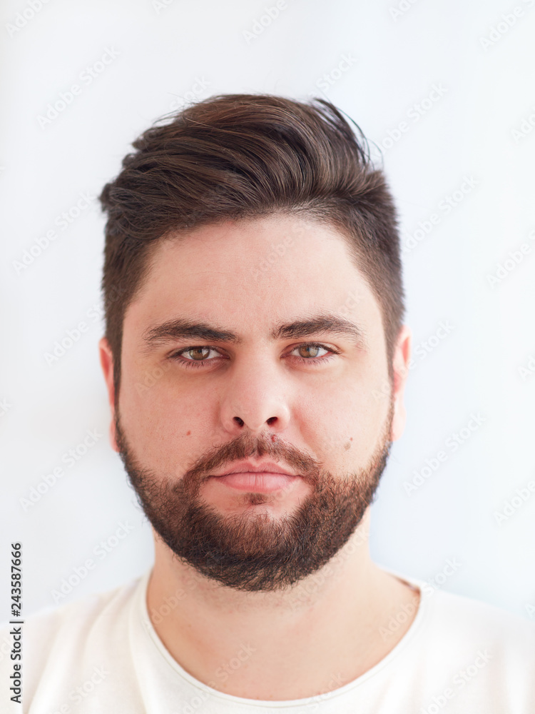 shoulder portrait of thirty years old, bearded man shoulder portrait of thirty years old, bearded man