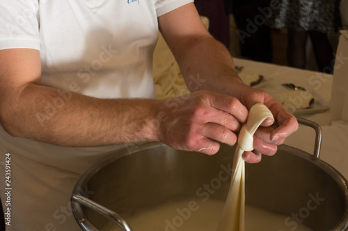 Close Up of the Hand Made Preparation of Italian Traditional Cheese called Mozzarella