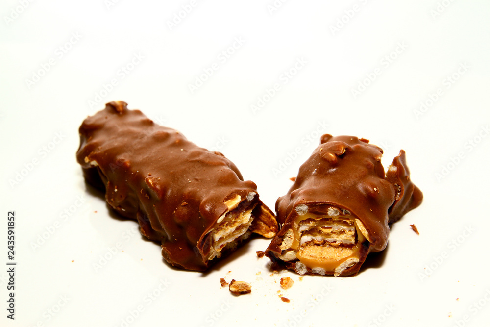 Chocolate background / Chocolate is a usually sweet, brown food preparation of roasted and ground cacao seeds Chocolate background / Chocolate is a usually sweet, brown food preparation of roasted and ground cacao seeds