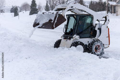 Skid steer snow