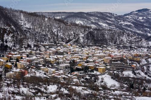 Horizontal View of the town of Terranova di Pollino in Winter, Covered with Snow