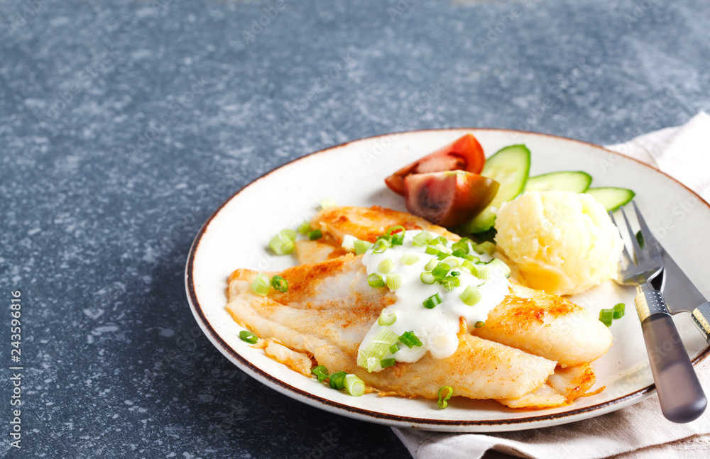 Fried Basa Fillet with sauce, mashed potato and fresh vegetables Fried Basa Fillet with sauce, mashed potato and fresh vegetables
