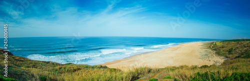 huge sandy beach with big waves