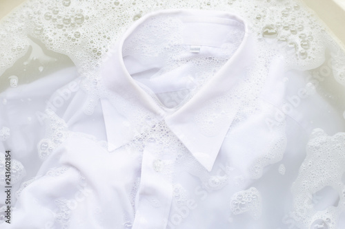 Soak cloth before washing, white shirt