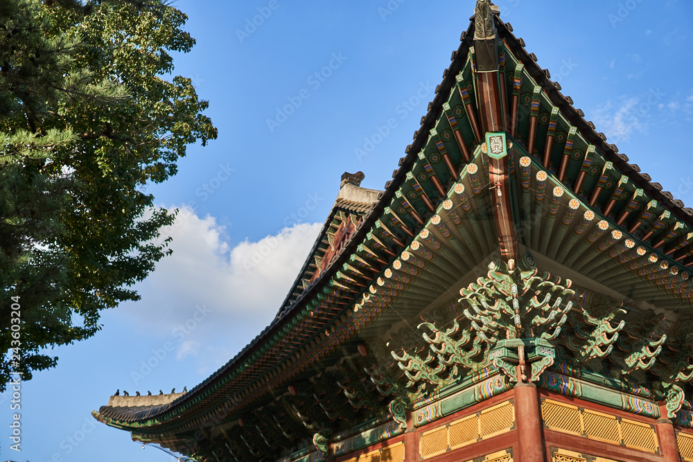 Traditional Korean building displaying diverse geometrical patterns and decorations at Deoksu palace in Seoul, South Korea.