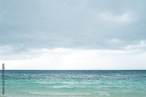 Empty sea, beach and cloudy sky