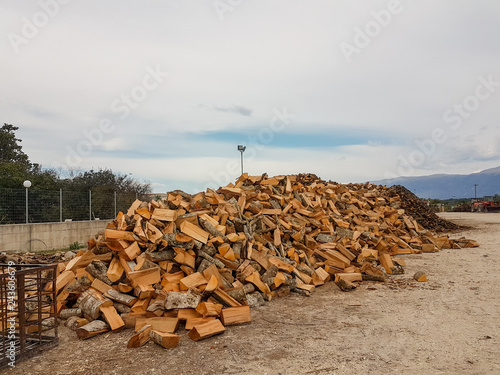 woods chopped in a pile for winter, fireplace photo