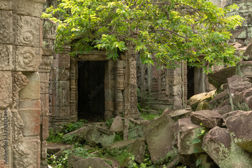 Pile of rocks beside two temple doorways Pile of rocks beside two temple doorways