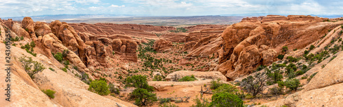 Panorama of Fin Canyon seen from Devils Garden Trail in Arches National Park, Utah photo