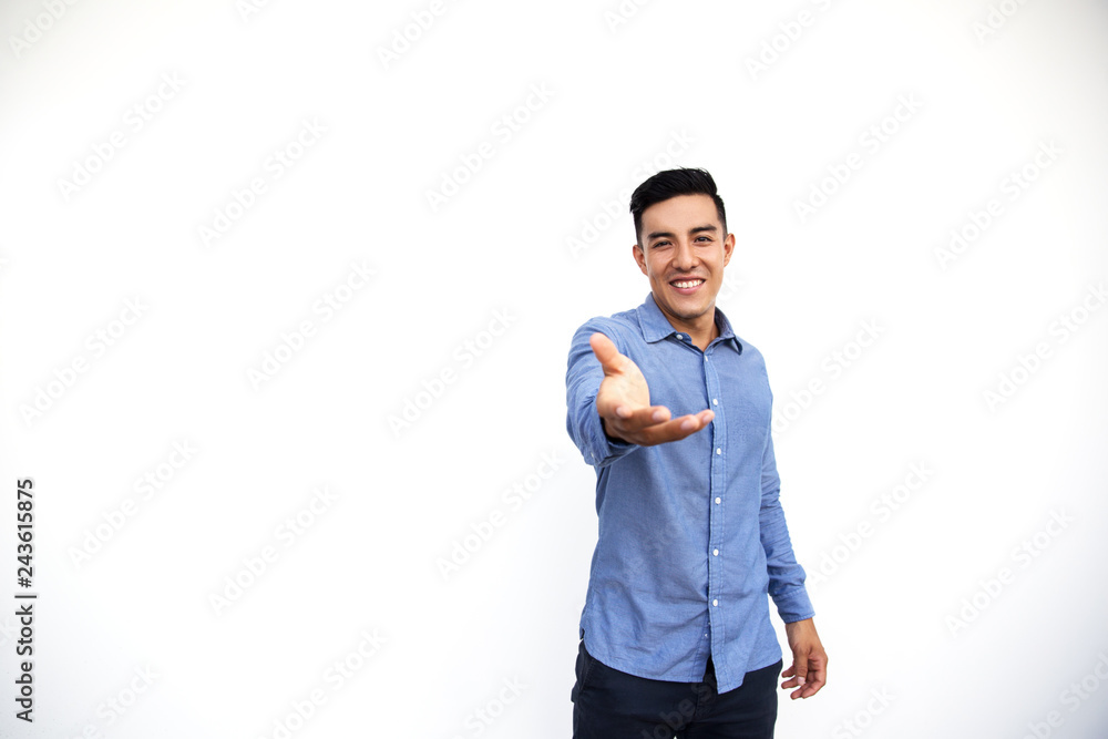 Young handsome businessman shaking hand isolated on white background. Young handsome businessman shaking hand isolated on white background.
