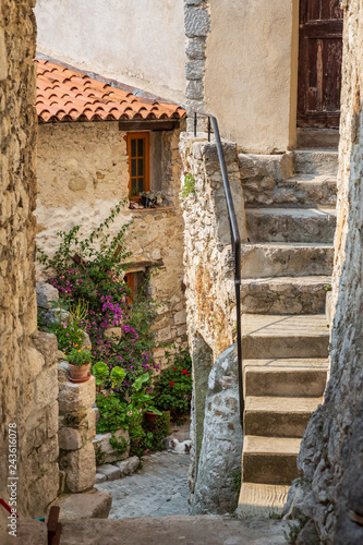 Fototapeta Naklejka Na Ścianę i Meble -  The stunning narrow cobblestone streets of the beautiful hilltop village of Peillon in the Alpes-Maritime department of southeastern France