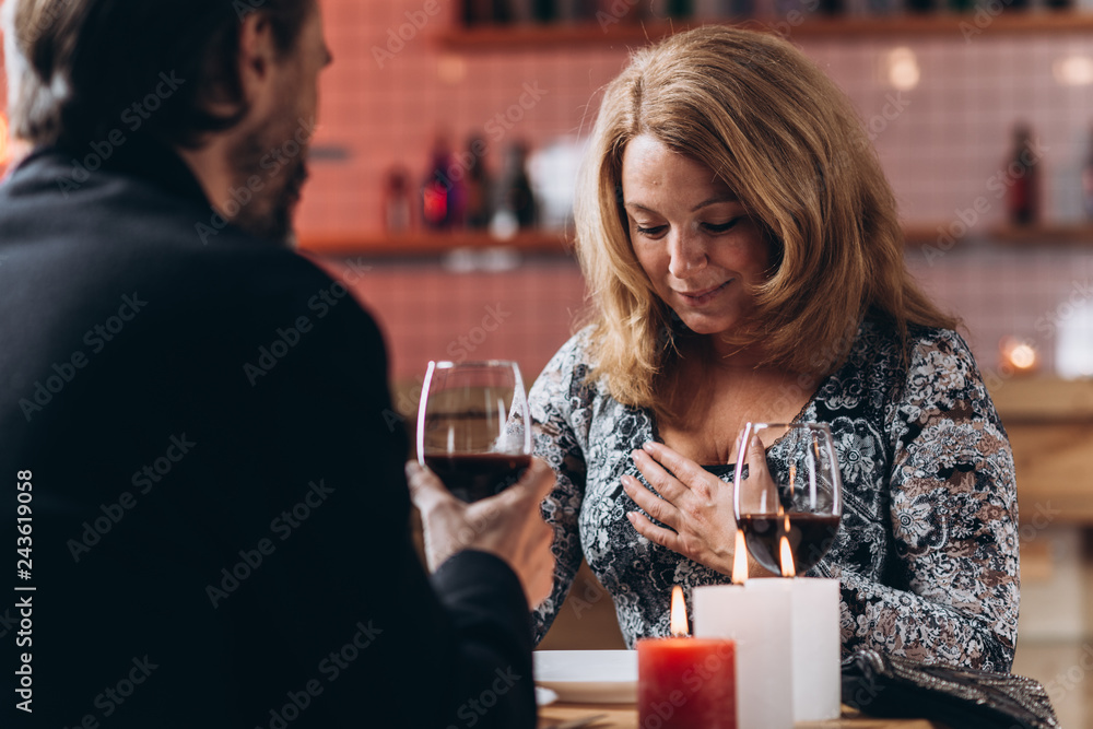 Middle aged couple have a romantic candlelit evening in a restaurant Middle aged couple have a romantic candlelit evening in a restaurant