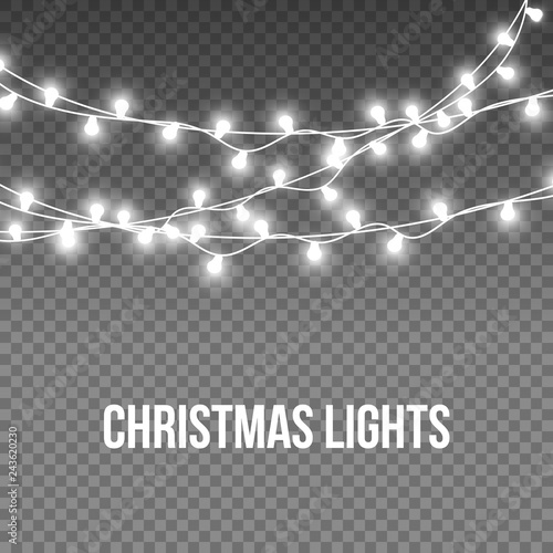 Realistic Silver Christmas Lights bulbs isolated on transparent background. Glowing lights for Christmas Holiday cards.  New Year Garlands  decorations . 