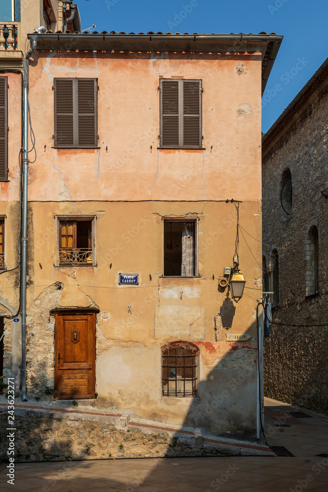 Charming weathered old building in the medieval hilltop village of Peille in southeastern France