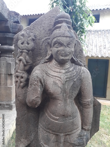 ancient ruin of hindu god kumara swamy photo