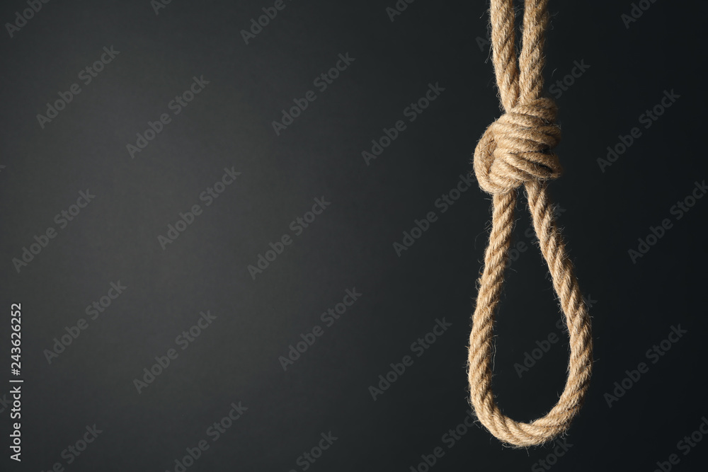 Rope with noose on dark background. Suicide awareness concept