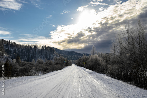 snowy mountain road © George