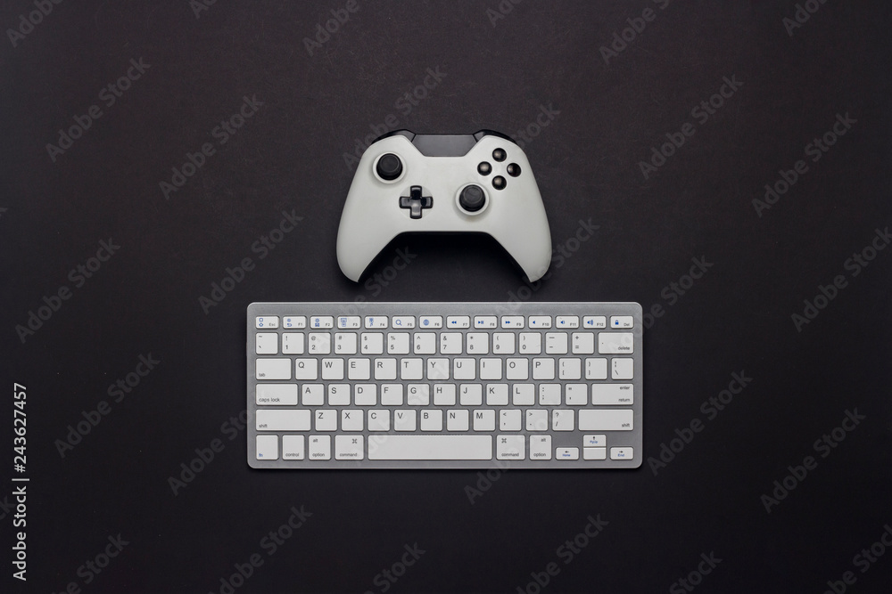 White gamepad and keyboard on a black background. Tactics of the game.  Concept game on the console and PC, computer games. Flat lay, top view.  Stock Photo | Adobe Stock