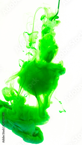 Color drop in water on a white background close-up, abstraction